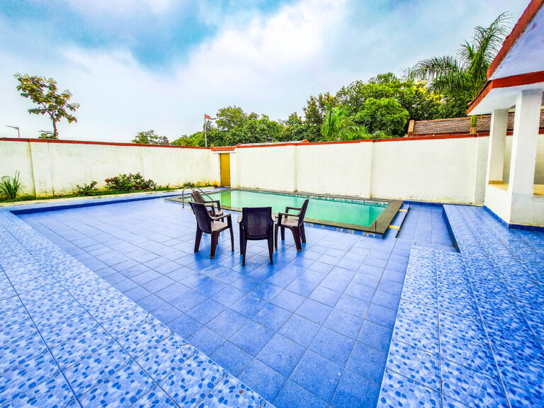 Sihra Villa, Neral: Four chairs grouped on the pool deck, by the pool