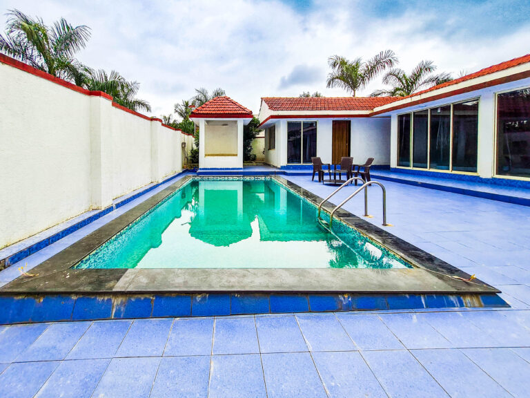 Sihra Villa, Neral: The private pool, with the gazebo and villa beyond