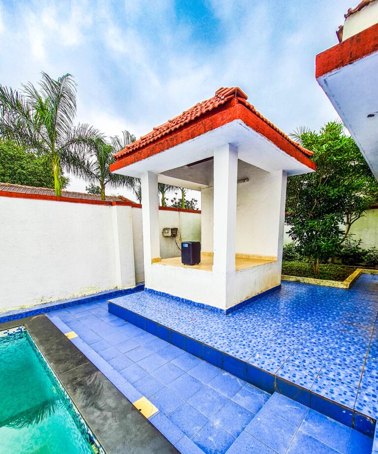 Sihra Villa, Neral: The gazebo by the pool, with its party speaker